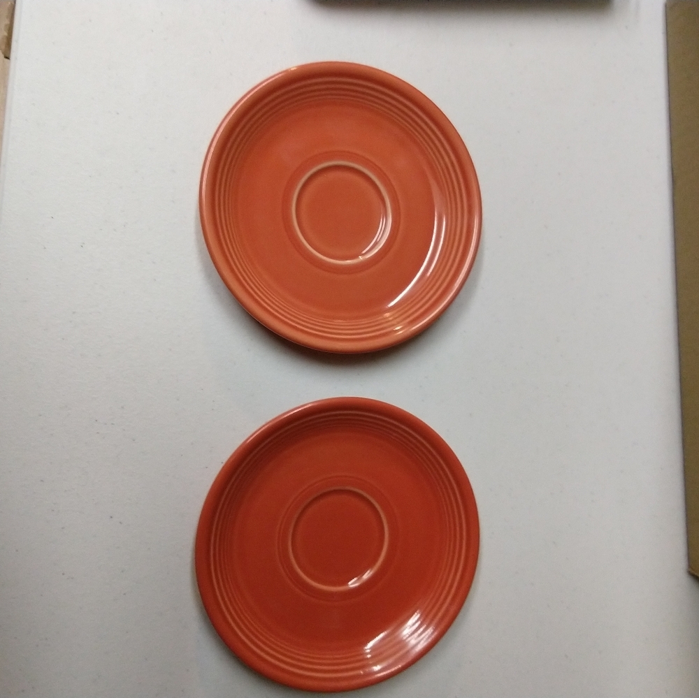 Fiesta orange saucer plates